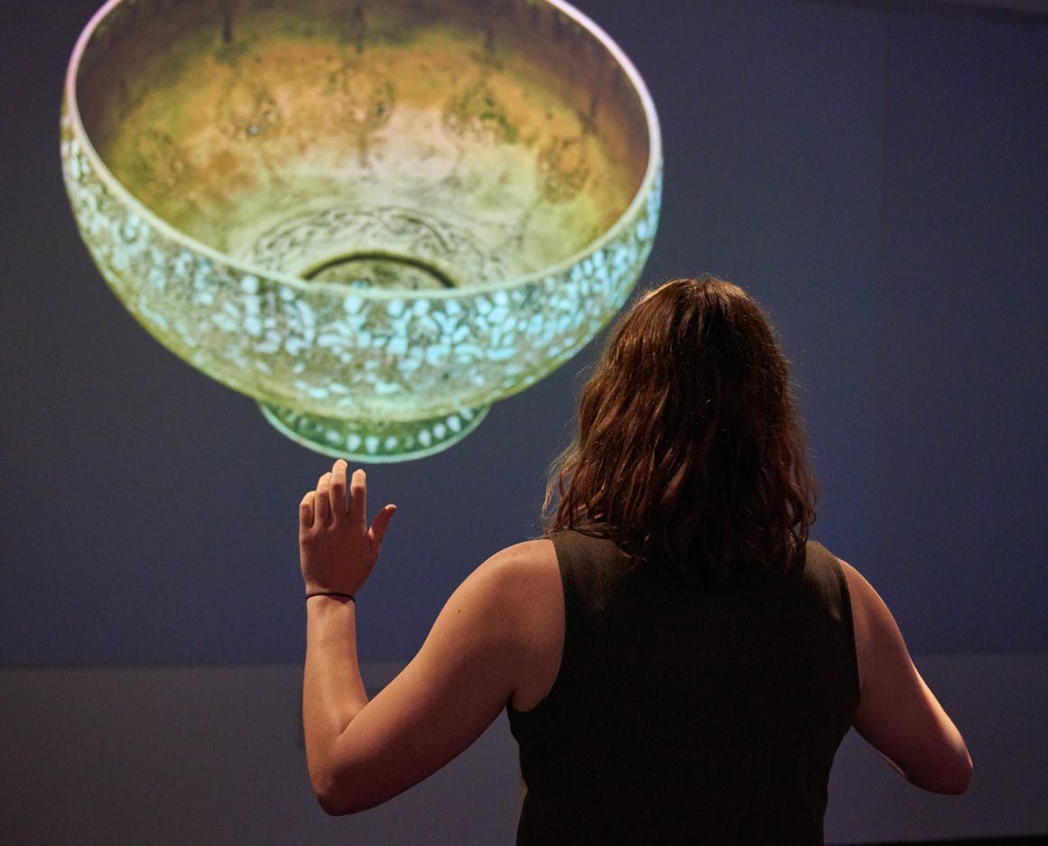 person using gesture based interactive in ArtLens
